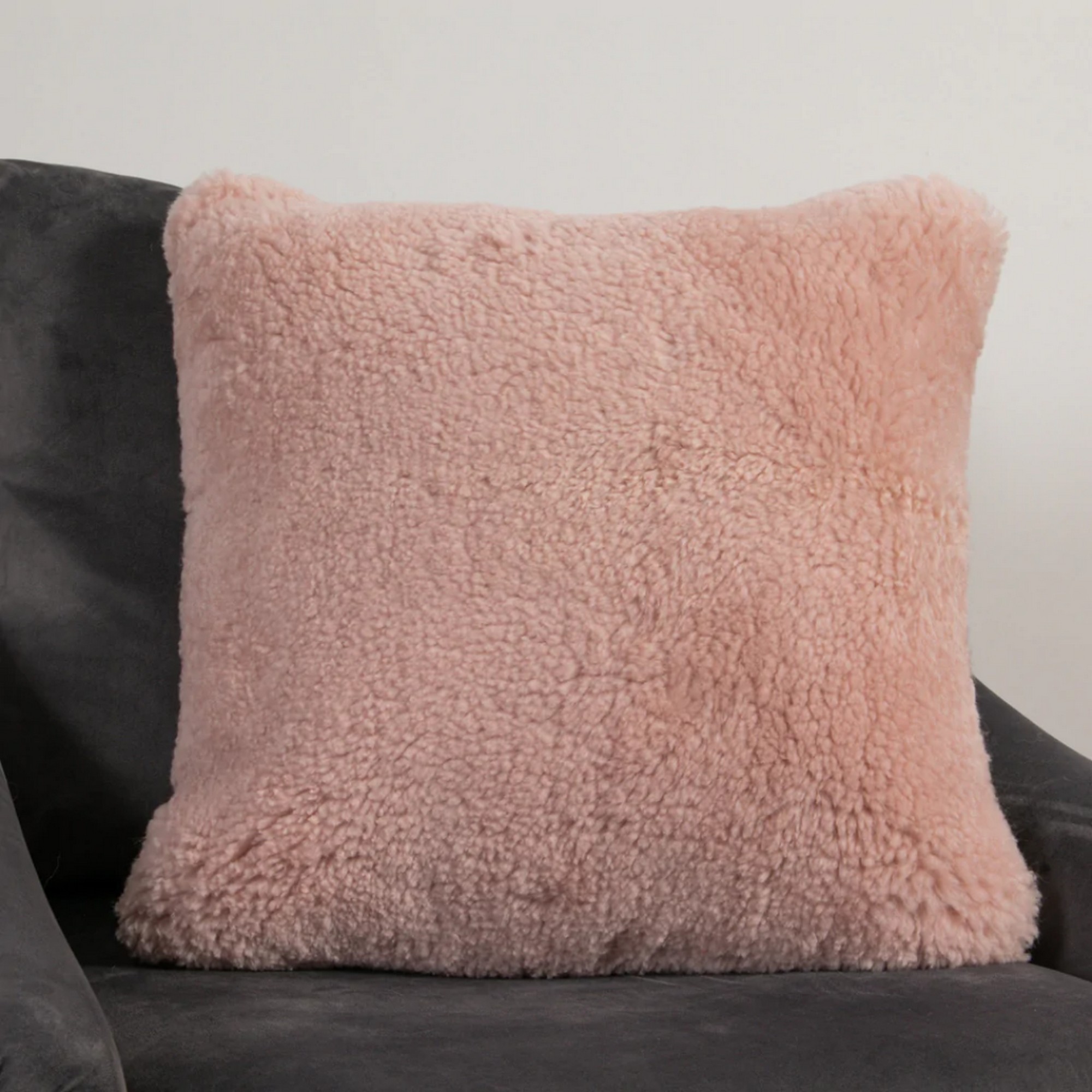 Talia Plain Sheepskin Cushion In Pink